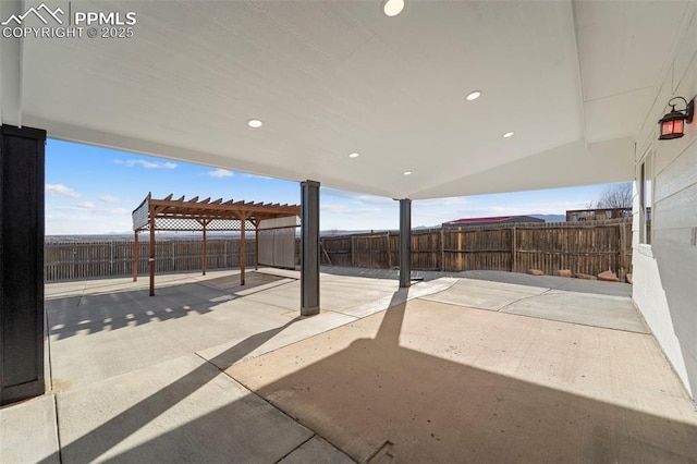 view of patio with a fenced backyard and a pergola