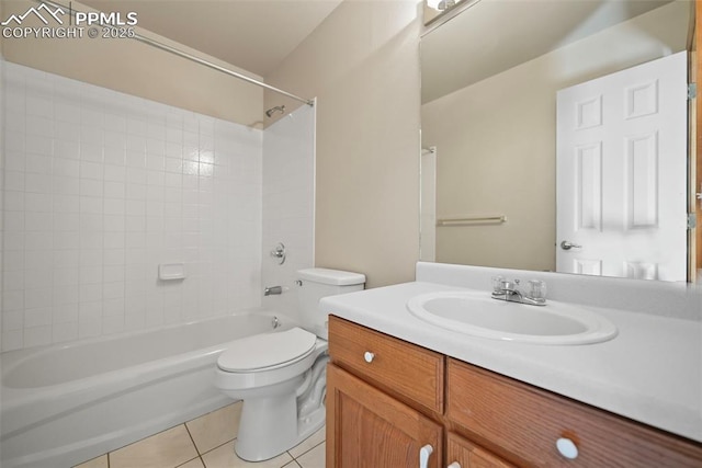 full bath with tile patterned floors, shower / bathtub combination, toilet, and vanity