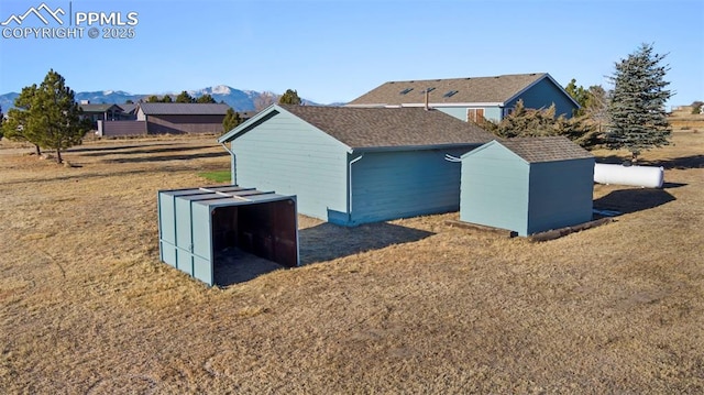 view of shed featuring a mountain view