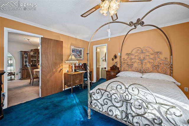 bedroom featuring a textured ceiling, carpet, and ornamental molding