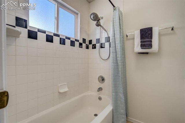 full bath featuring shower / tub combo