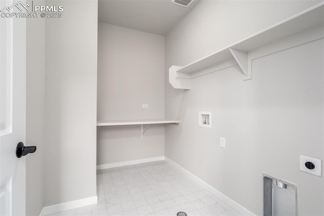 washroom with laundry area, hookup for a washing machine, baseboards, and hookup for an electric dryer