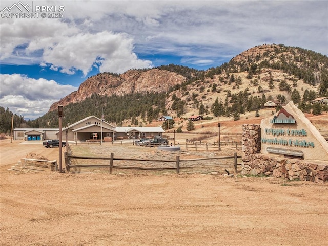 property view of mountains with a rural view