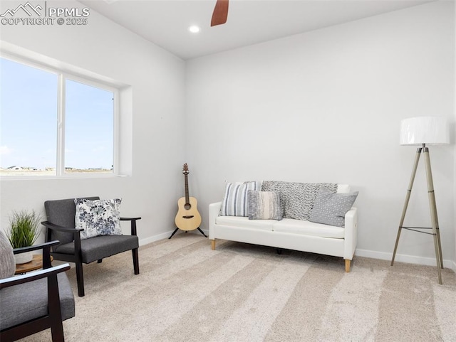 sitting room with recessed lighting, baseboards, and carpet floors