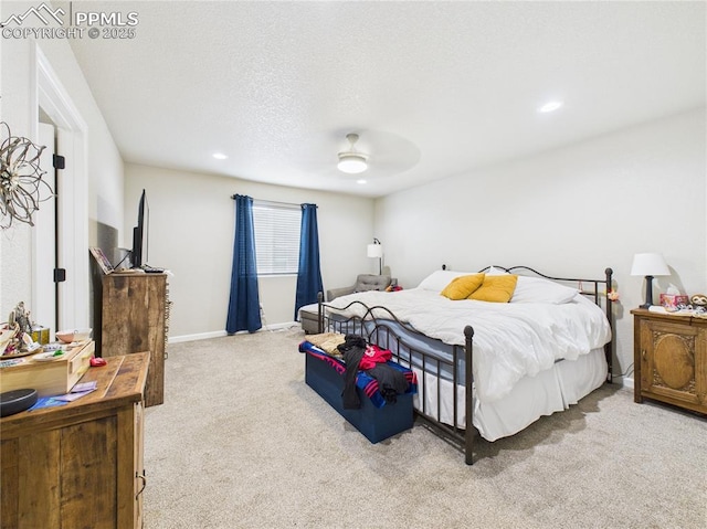 bedroom featuring a ceiling fan, baseboards, carpet floors, recessed lighting, and a textured ceiling