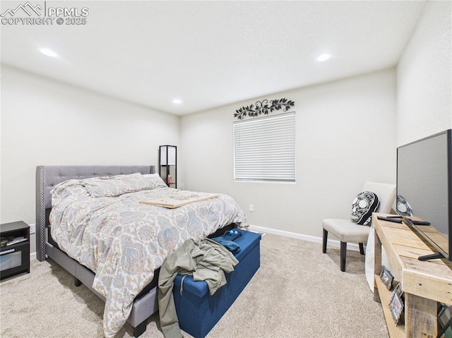 bedroom with recessed lighting, baseboards, and light colored carpet