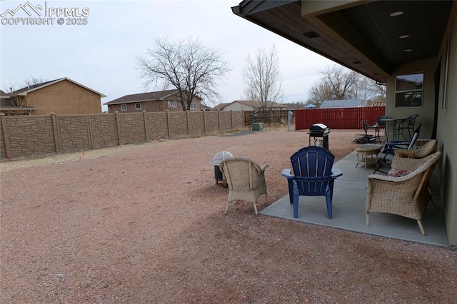 view of yard with a patio and a fenced backyard