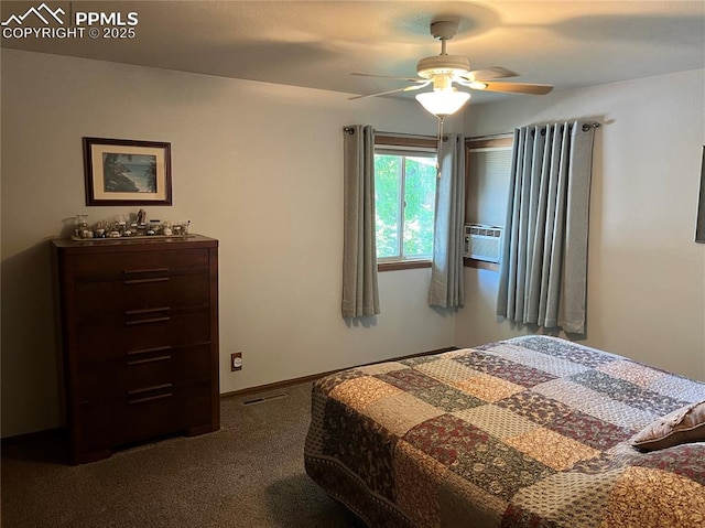 bedroom featuring visible vents, ceiling fan, baseboards, and dark colored carpet