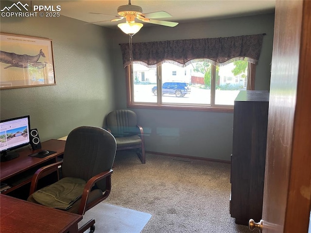 home office with a wealth of natural light, baseboards, and ceiling fan