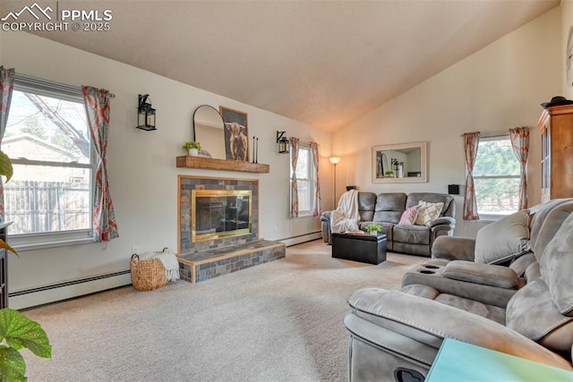 carpeted living room with a baseboard radiator, vaulted ceiling, and a glass covered fireplace