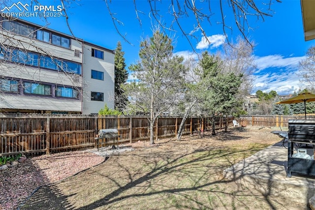 view of yard featuring a fenced backyard