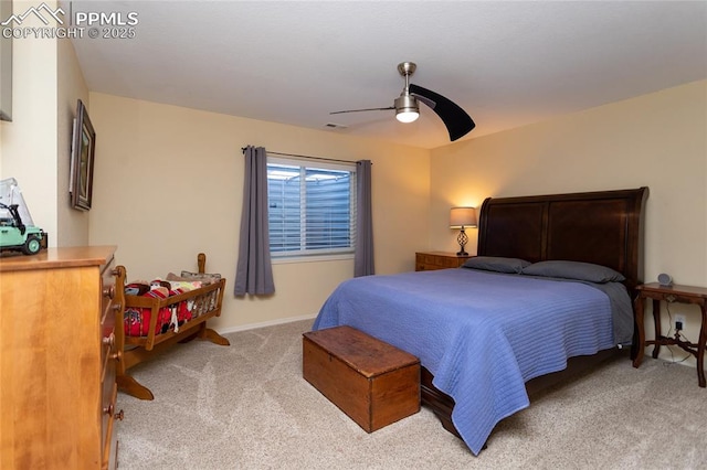 bedroom featuring visible vents, ceiling fan, and carpet flooring