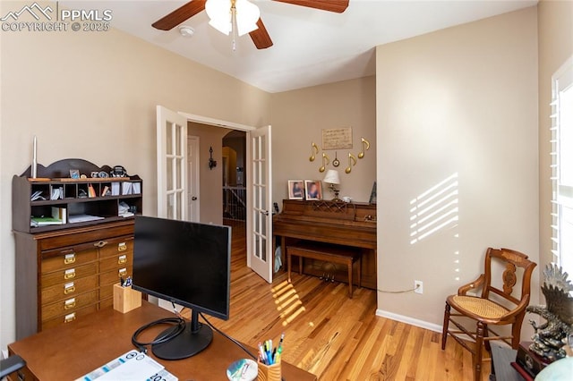 office featuring wood finished floors, baseboards, french doors, and ceiling fan