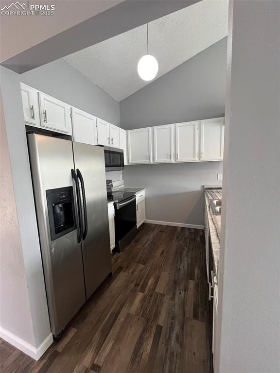 4535 Lamplighter Cir, Colorado Springs, CO 80916 - kitchen featuring dark wood finished floors, white cabinets, appliances with stainless steel finishes, and a textured ceiling
