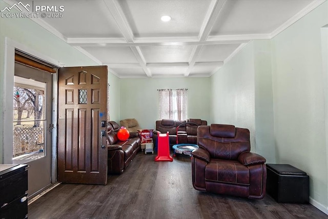 living area featuring dark wood-style floors, beamed ceiling, coffered ceiling, and ornamental molding