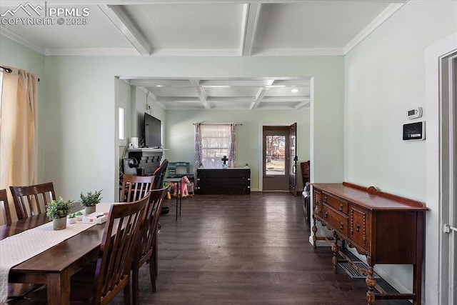 dining area with beam ceiling, ornamental molding, coffered ceiling, and wood finished floors