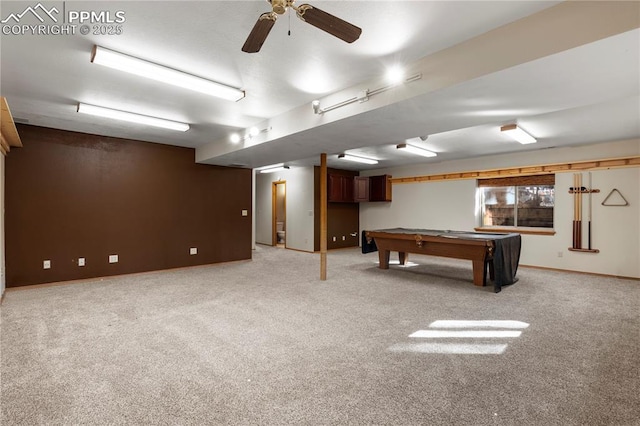 rec room featuring baseboards, light carpet, ceiling fan, and billiards