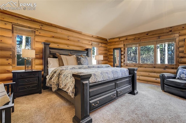 bedroom with multiple windows, lofted ceiling, and carpet