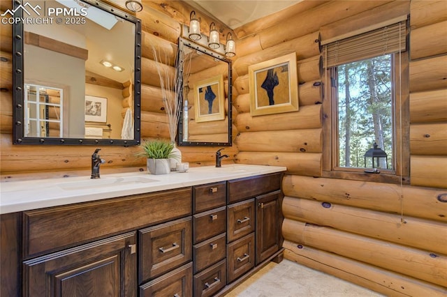 full bath featuring double vanity and a sink