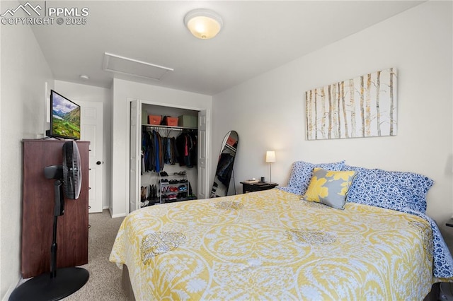 carpeted bedroom featuring a closet and attic access