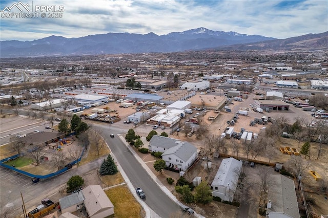 drone / aerial view featuring a mountain view