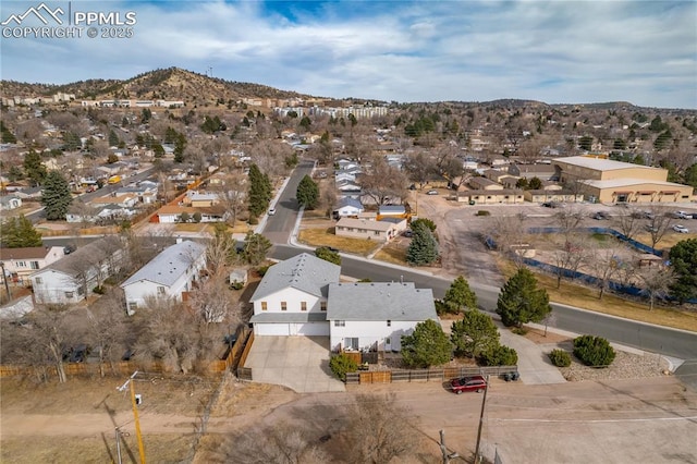 bird's eye view with a mountain view and a residential view