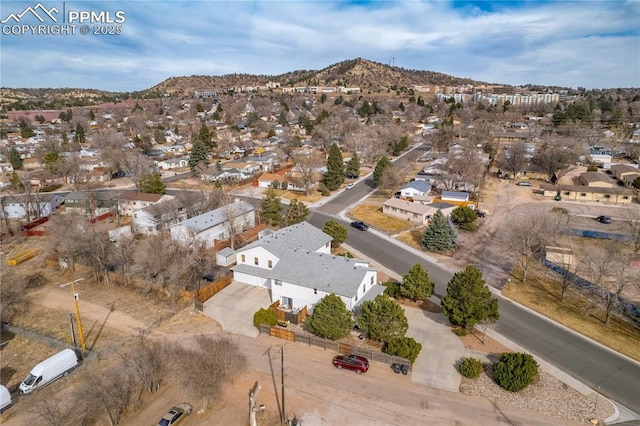 aerial view with a mountain view and a residential view