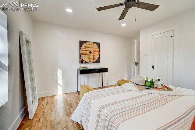 bedroom with a ceiling fan, recessed lighting, baseboards, and light wood finished floors