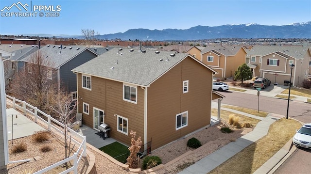 3867 Papuan Dr, Colorado Springs, CO 80922 - aerial perspective of suburban area with a mountainous background