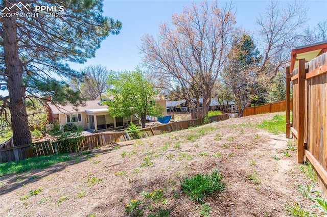 view of yard featuring fence