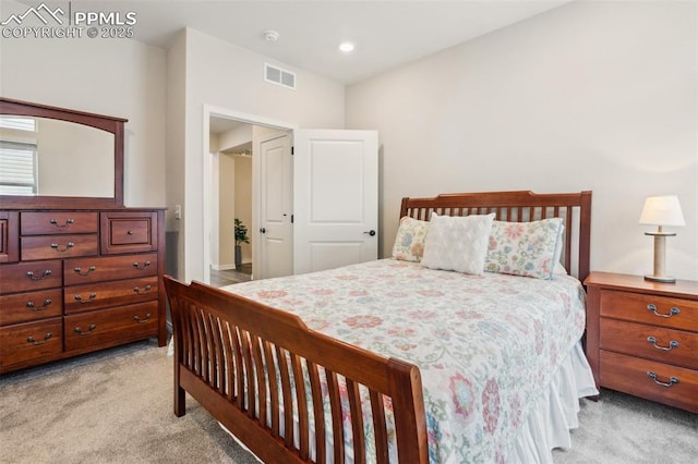 6001 Bennach Grv, Colorado Springs, CO 80927 - bedroom with visible vents and light carpet