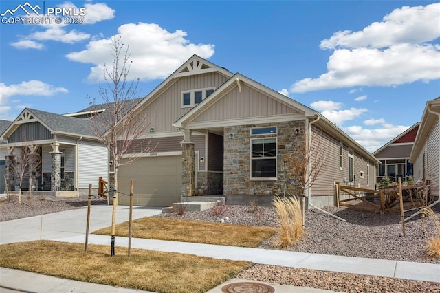 6001 Bennach Grv, Colorado Springs, CO 80927 - craftsman inspired home with stone siding, an attached garage, board and batten siding, and driveway