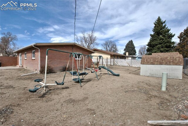 113 Amherst St, Colorado Springs, CO 80911 - view of yard featuring a playground and fence