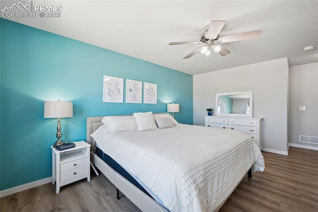 8040 Barraport Dr, Colorado Springs, CO 80908 - bedroom featuring baseboards, visible vents, and wood finished floors