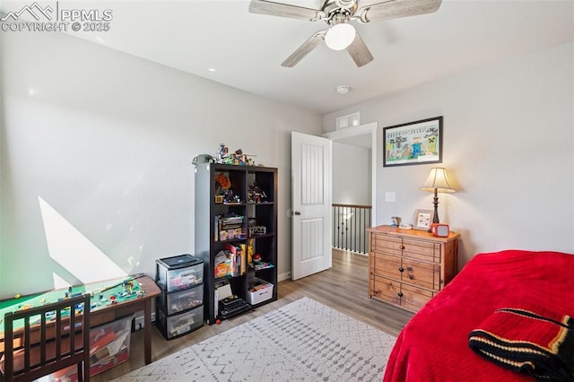 8040 Barraport Dr, Colorado Springs, CO 80908 - bedroom featuring wood finished floors and ceiling fan