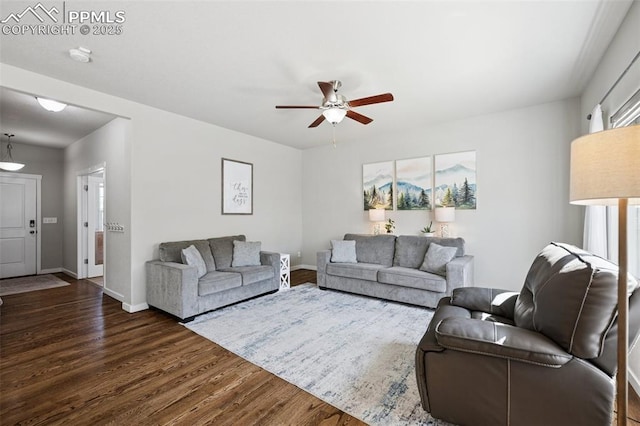8040 Barraport Dr, Colorado Springs, CO 80908 - living area with baseboards, dark wood-type flooring, and a ceiling fan