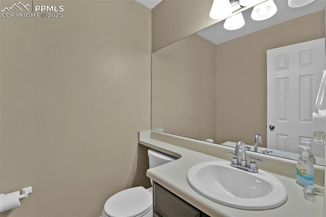 half bath with toilet and vanity