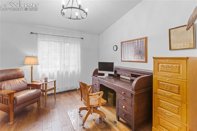 266 University Dr, Woodland Park, CO 80863 - office with hardwood / wood-style flooring, a chandelier, and vaulted ceiling