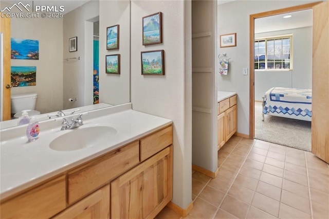 266 University Dr, Woodland Park, CO 80863 - bathroom featuring tile patterned floors, toilet, and vanity