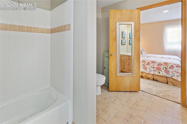 266 University Dr, Woodland Park, CO 80863 - bathroom featuring tile patterned flooring, toilet, and connected bathroom