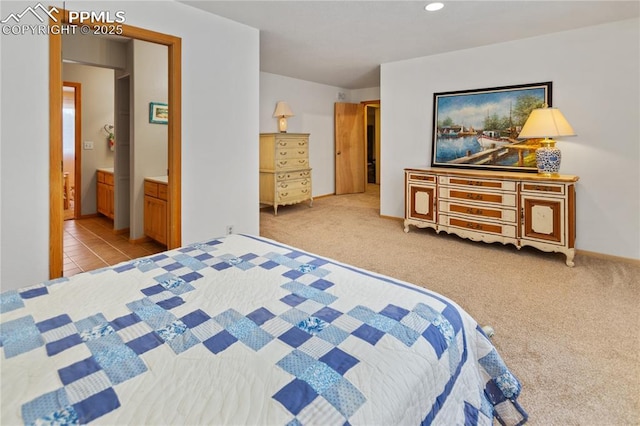 266 University Dr, Woodland Park, CO 80863 - bedroom with recessed lighting, connected bathroom, and carpet floors