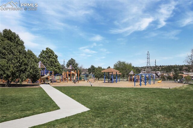 view of yard featuring playground community
