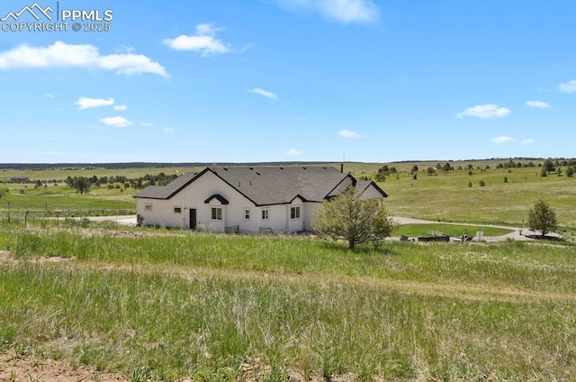 5409 Haes Haven Vw, Colorado Springs, CO 80908 - view of front facade with stucco siding and a rural view