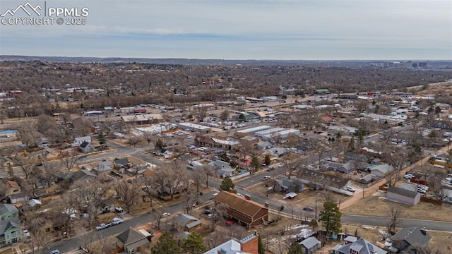 birds eye view of property with a residential view