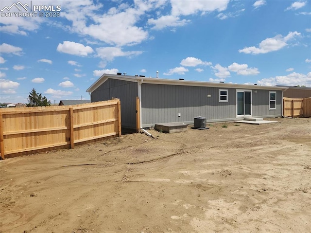 249 Arrowhead Dr, Florence, CO 81226 - back of property featuring central AC unit