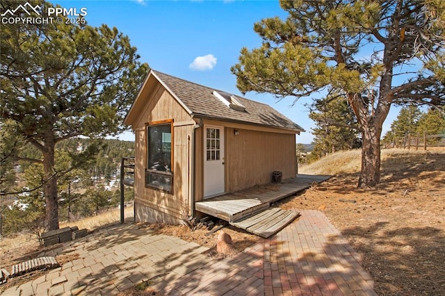 view of outbuilding with an outdoor structure