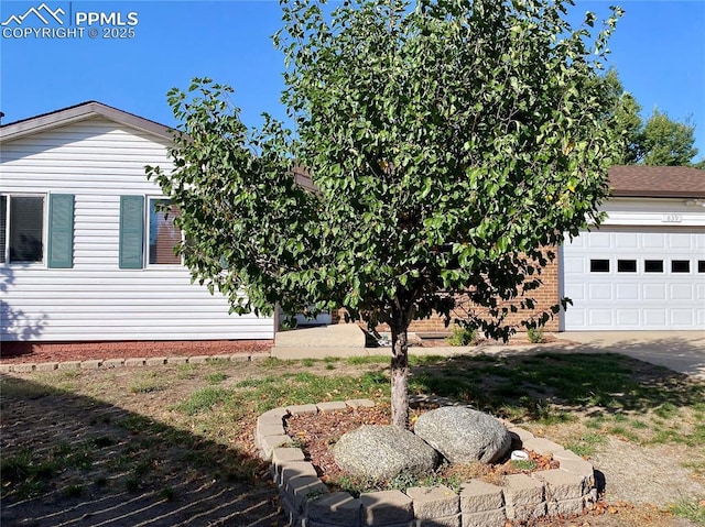 exterior space featuring an attached garage