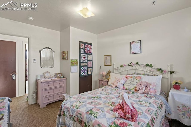 bedroom featuring carpet