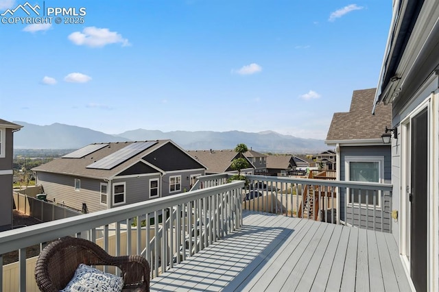 1632 Derbyshire St, Colorado Springs, CO 80910 - wooden terrace featuring a residential view and a mountain view