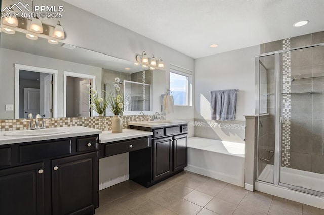 1632 Derbyshire St, Colorado Springs, CO 80910 - bathroom with a bath, tile patterned floors, backsplash, and a shower stall